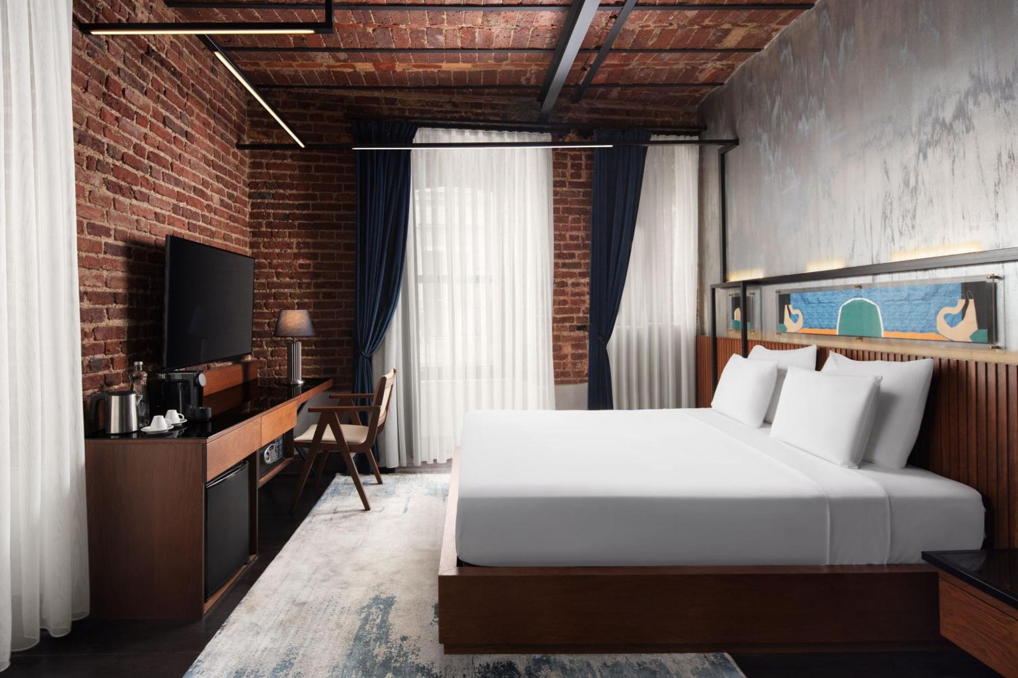 Decamondo Galata, A Tribute Portfolio Hotel Isztambul Kültér fotó A rendering of a guest room at the forthcoming Hotel Indigo in the South Loop.