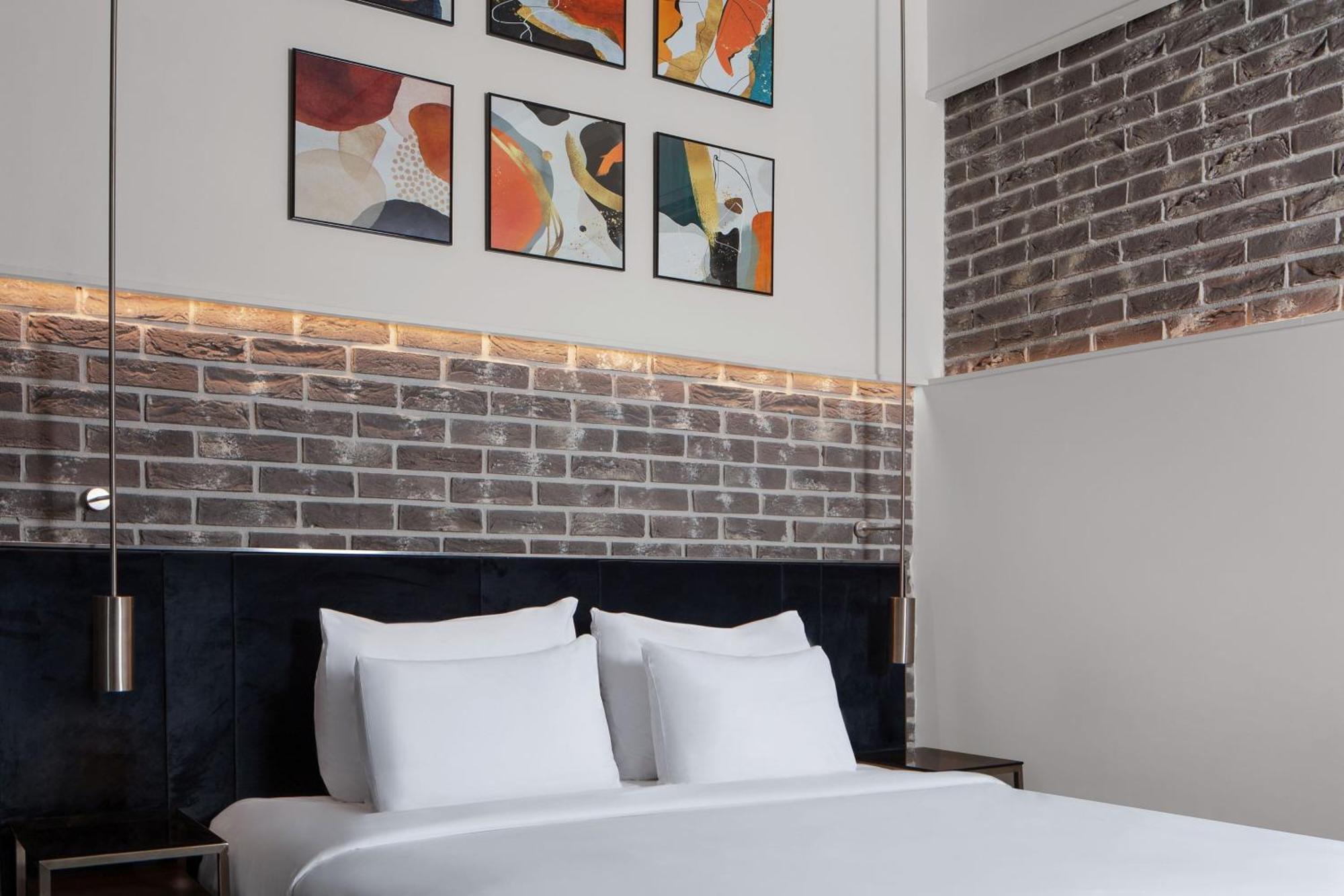 Decamondo Galata, A Tribute Portfolio Hotel Isztambul Kültér fotó A bedroom at the hotel